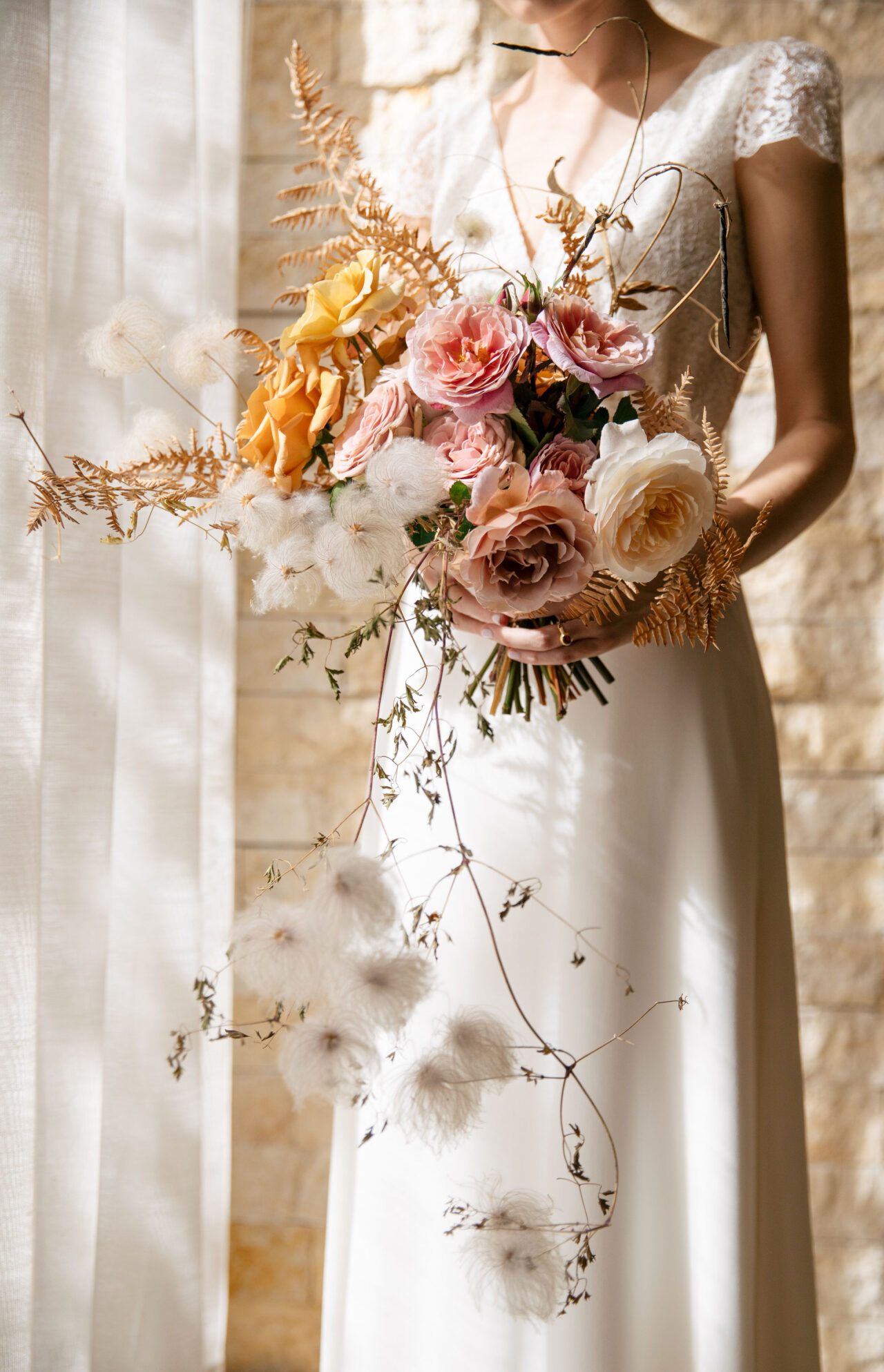 bride with colorful bouquet