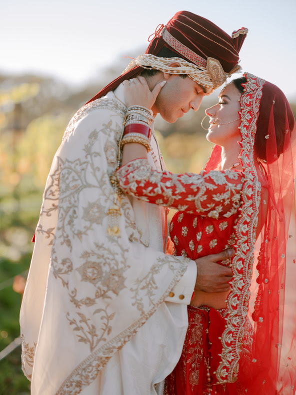 bride and groom in loving embrace